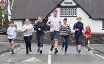 Ken Grayson and his children with the organisers of the Llandegfan Fun Run