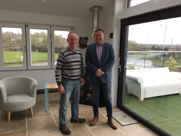 Dyfed Williams, senior installer, who retired after 32 years at Peninsula with Ken Grayson