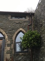 External view of gothic window and front door
