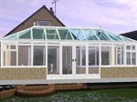 Glass roofed conservatory with 'Liv-in' room feature