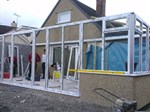 Glass roofed conservatory with 'Liv-in' room feature