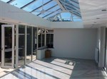 Glass roofed conservatory with 'Liv-in' room feature