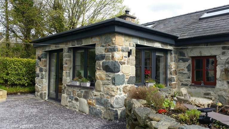 Sympathetic Stone-clad Orangery