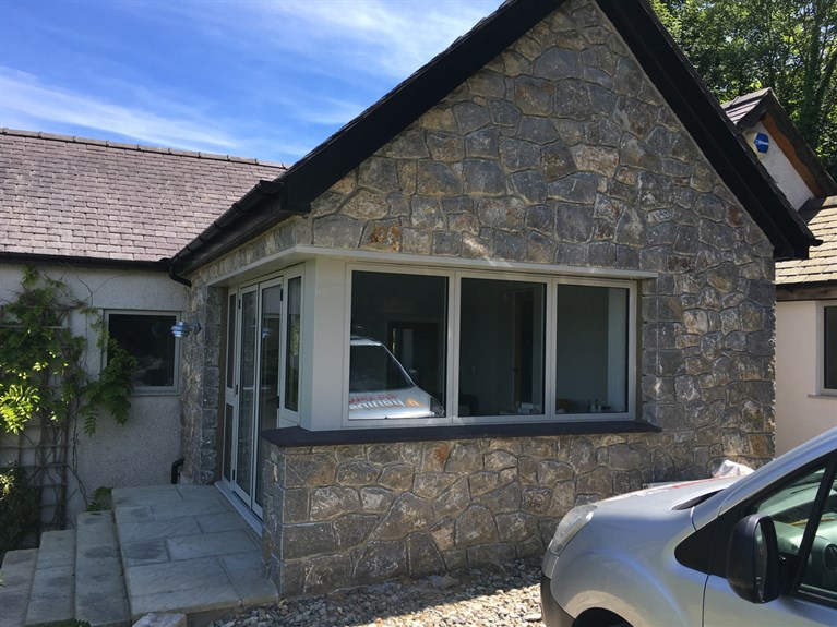 New windows and doors in a sun room
