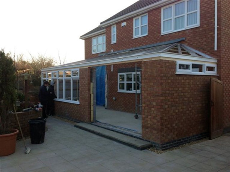 Solid roof conservatory extension