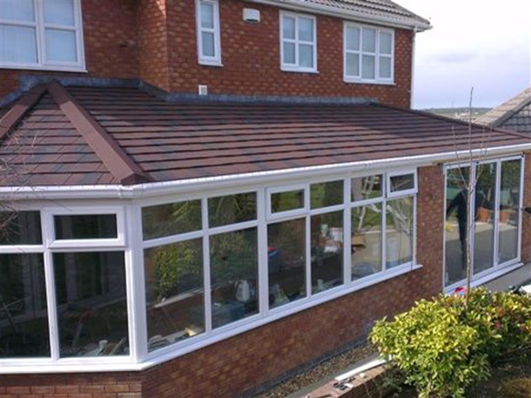 Solid roof conservatory extension