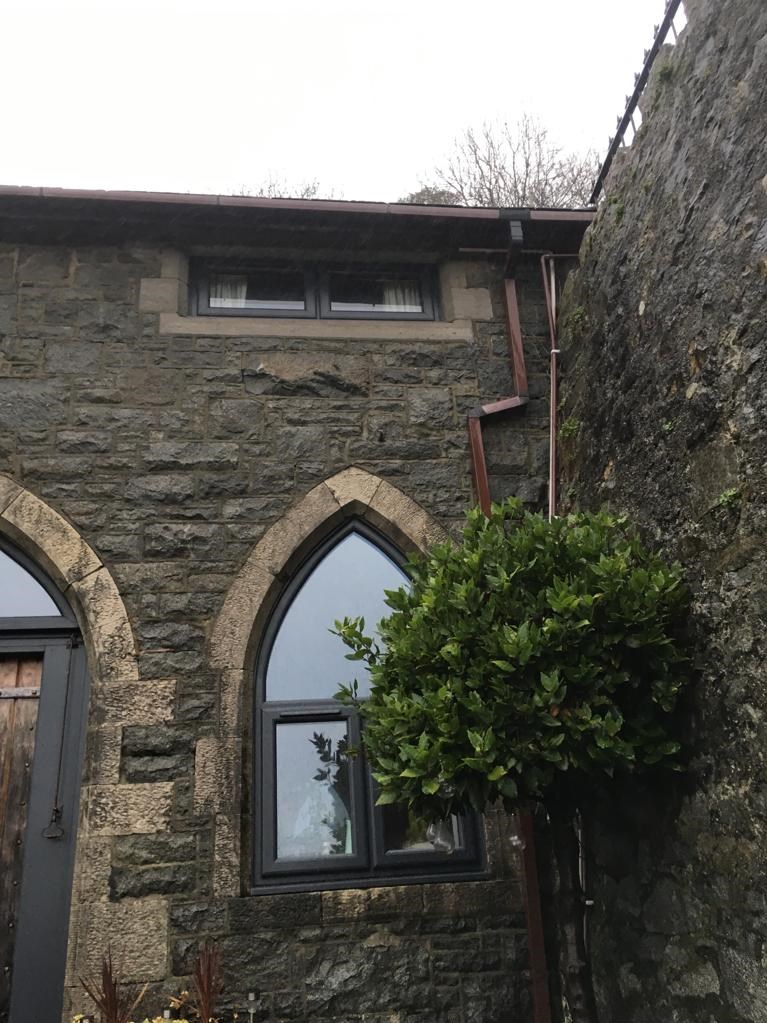 External view of gothic window and front door